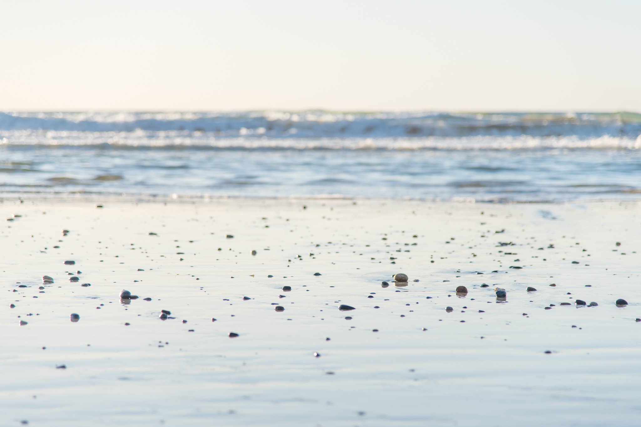 Kingwood photographer - calming image of stones on San Diego beach