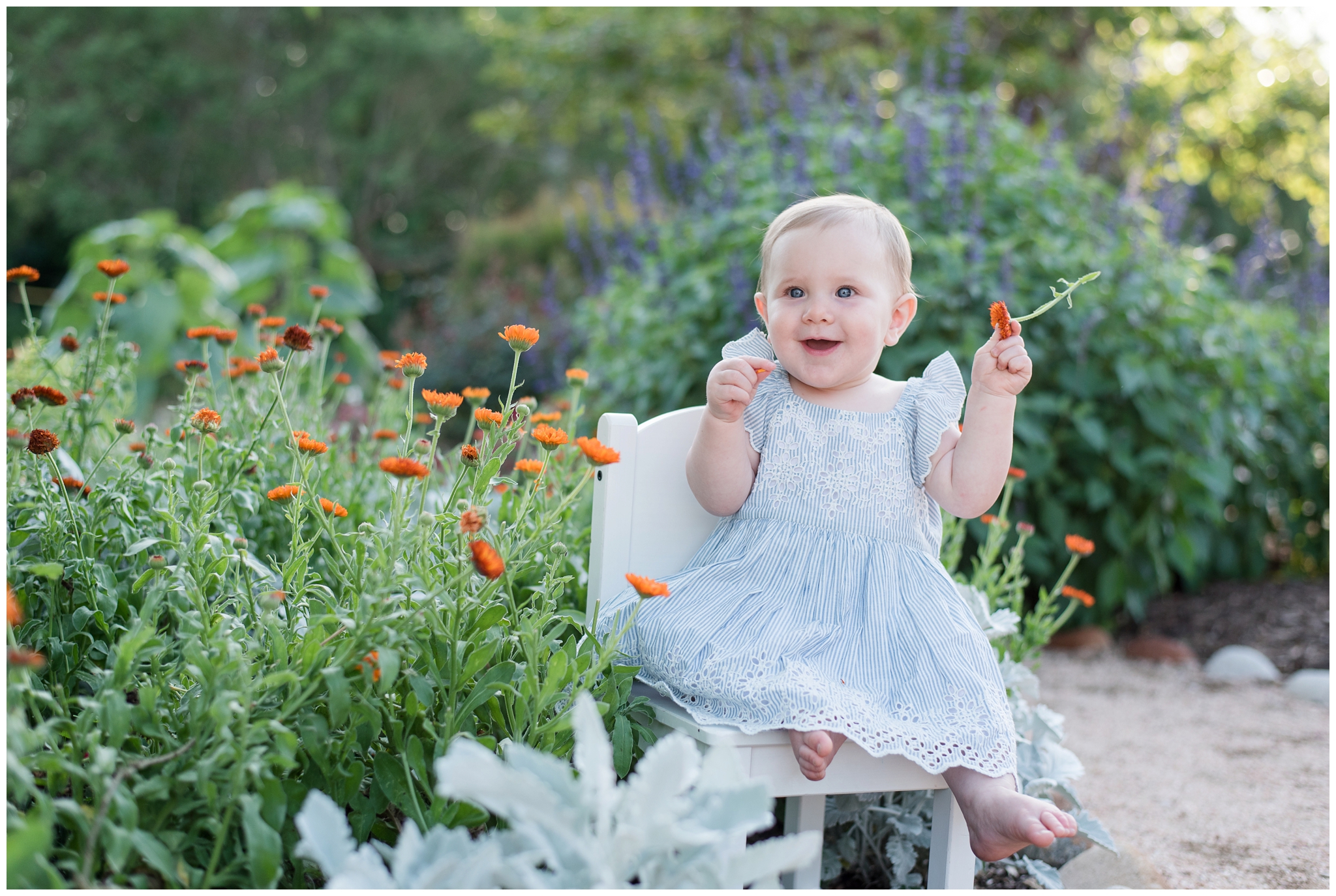 Kingwood child photographer session with 9 month old baby girl in spring garden
