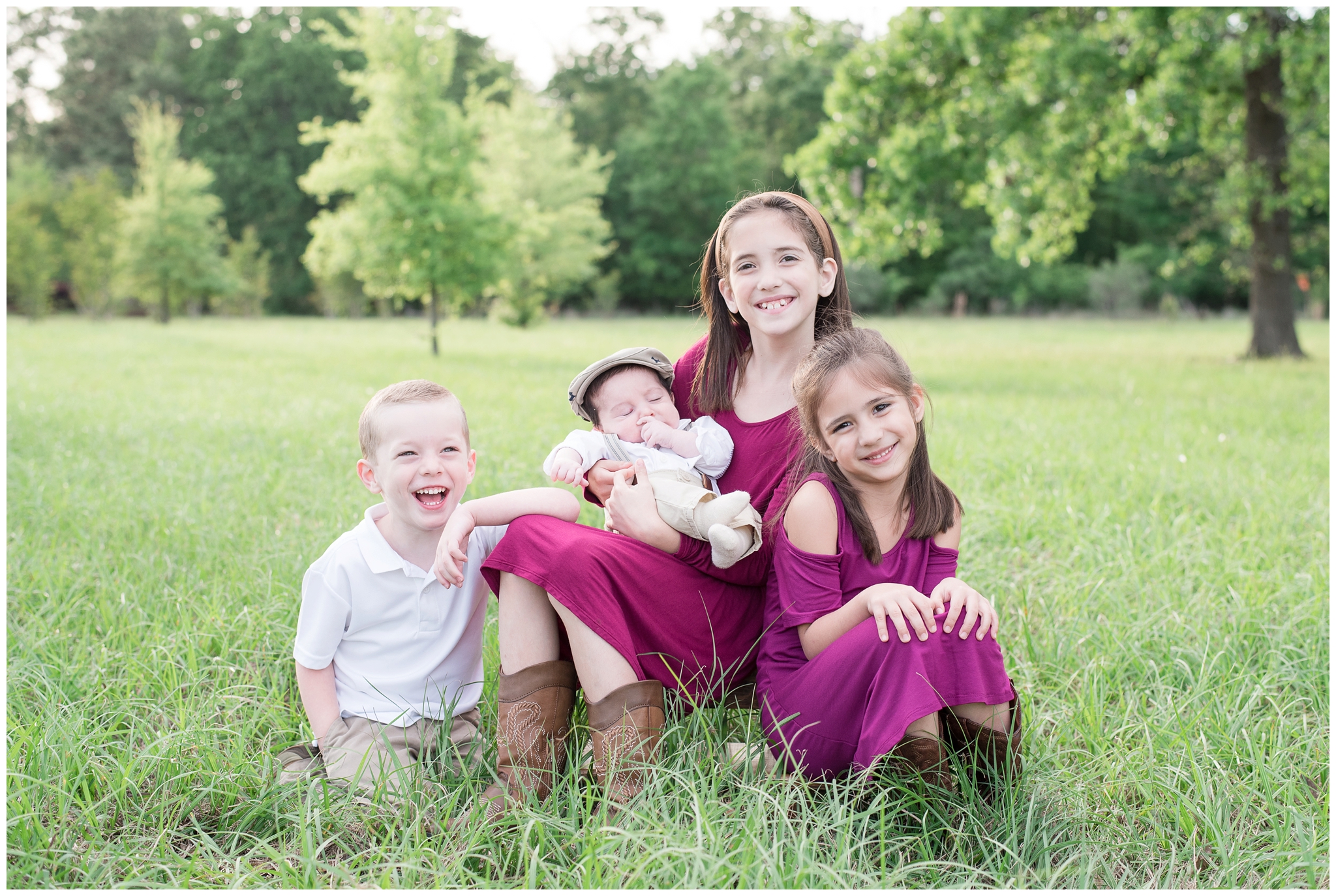 Kingwood family photographer portrait session with four cousins ages 3 months to 8 years old