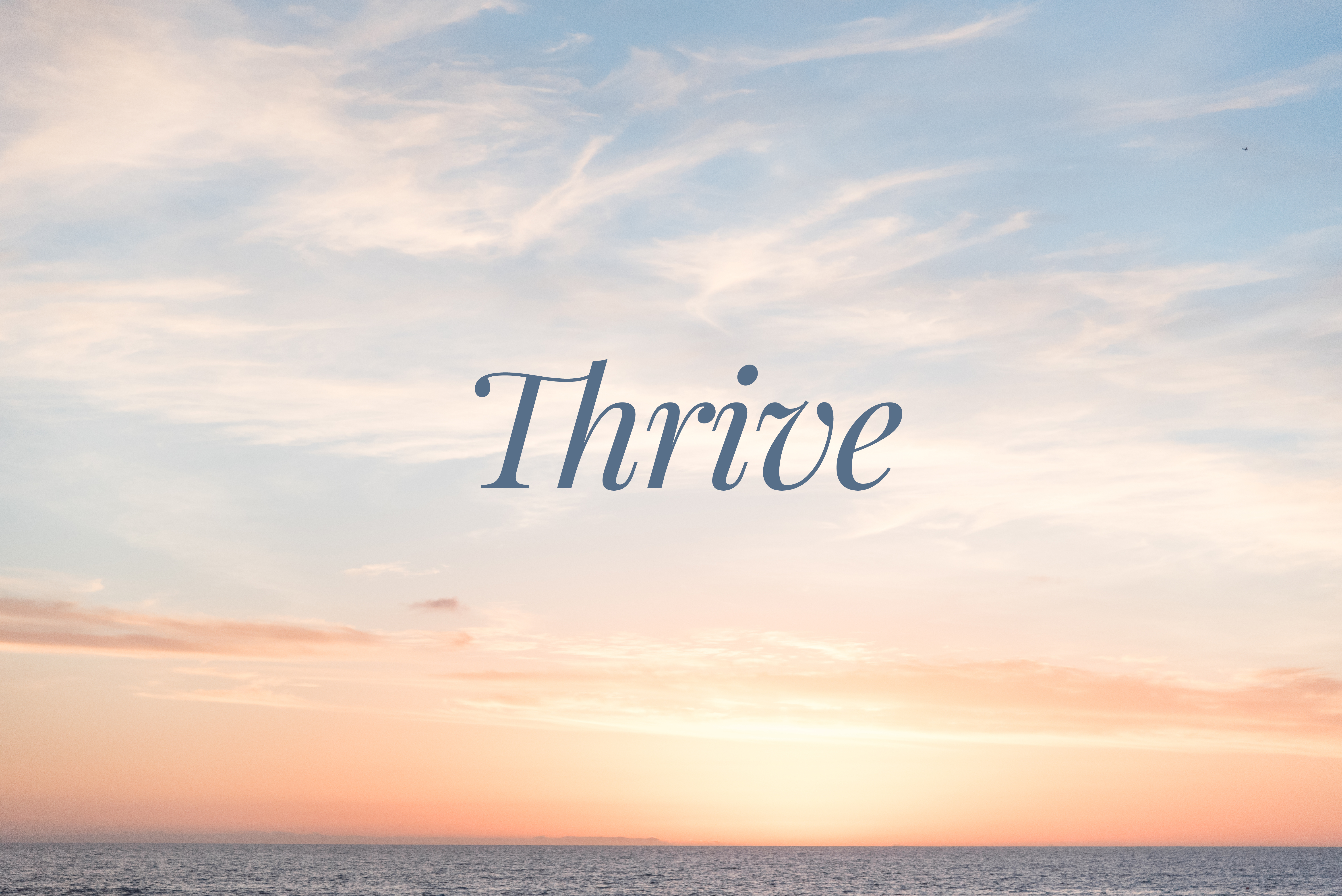 Kingwood Photographer's 2019 word of the year, "thrive," over a picture of a sunset in San Clemente, Ca