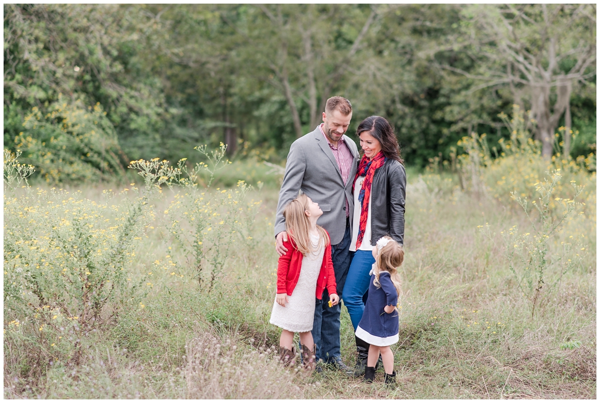 Kingwood family photographer mini session with family of four in natural, outdoor setting
